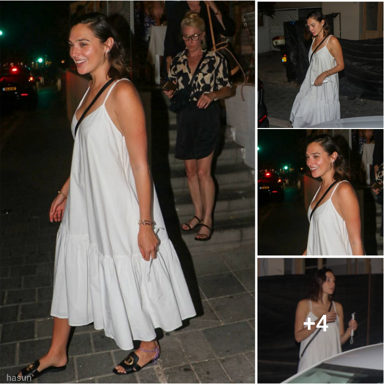 Stunning Gal Gadot dazzles in a flowing maxi dress during a fun night out with friends in Tel Aviv, marking a delightful postpartum moment after welcoming her third child.